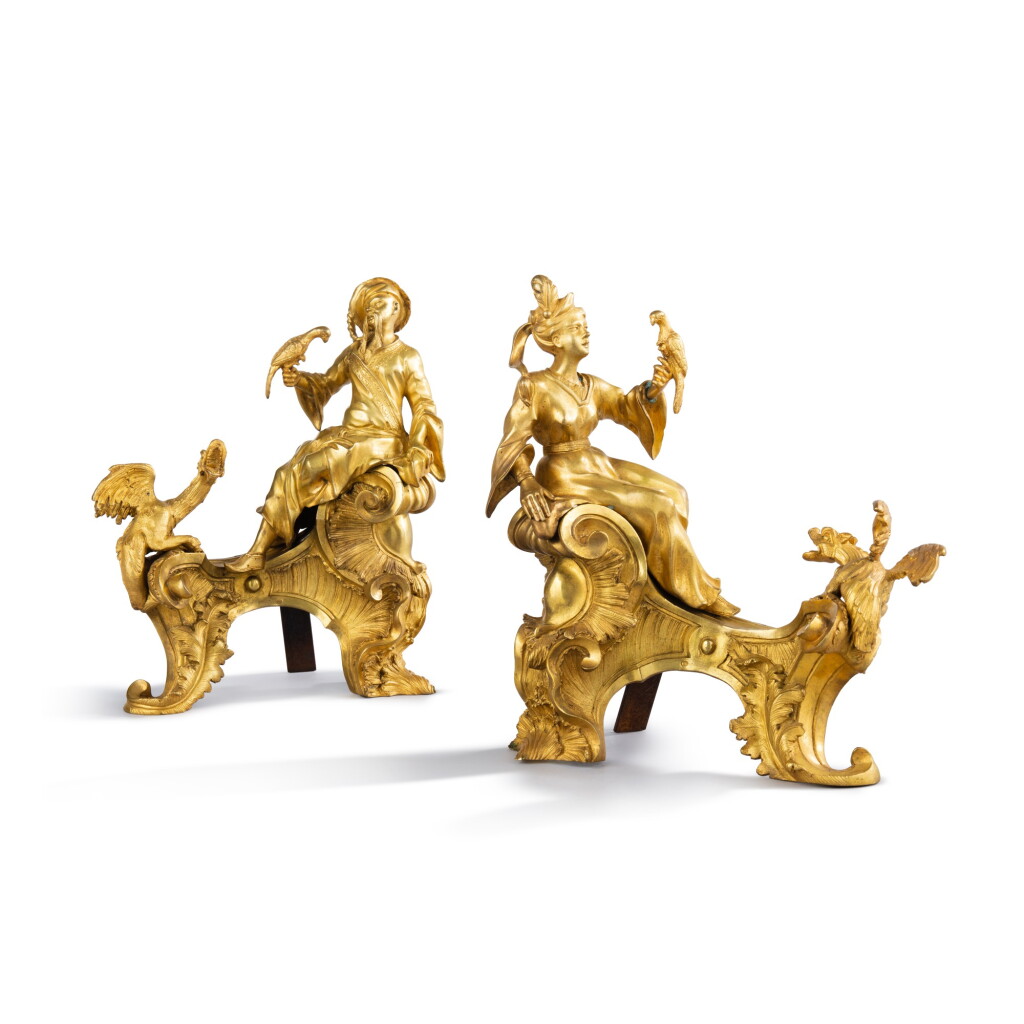 View full screen - View 1 of Lot 453. A pair of Louis XV gilt-bronze figural chenets, circa 1745-1749.