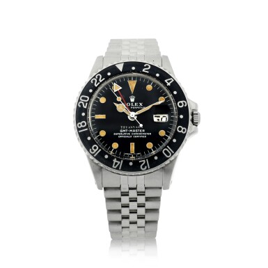 View full screen - View 1 of Lot 66. REFERENCE 1675 GMT-MASTER RETAILED BY TIFFANY & CO.: A STAINLESS STEEL AUTOMATIC DUAL-TIME WRISTWATCH WITH DATE AND BRACELET, CIRCA 1972.