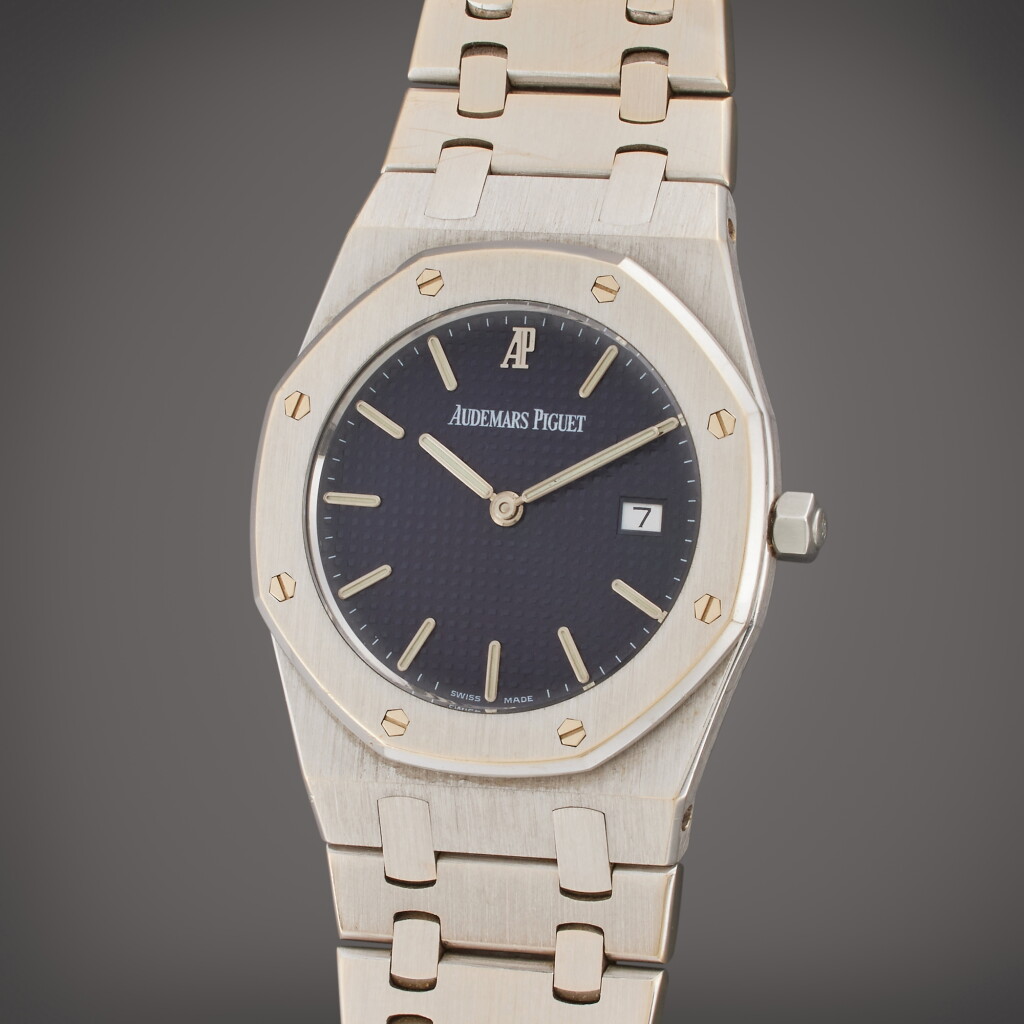 View full screen - View 1 of Lot 454. Reference 56303ST.OO.078 Royal Oak | A white gold wristwatch with date and bracelet, Circa 1995.