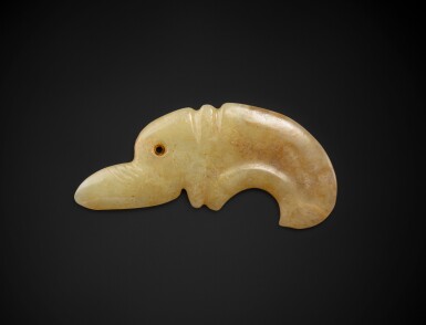 View full screen - View 1 of Lot 78. A rare celadon jade bird-shaped 'Hook' ornament Neolithic period, Hongshan culture | 新石器時代 紅山文化青白玉鳥形飾.