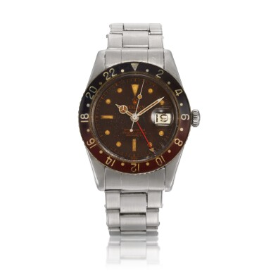 View full screen - View 1 of Lot 4. ‘Pussy Galore’ GMT-Master, Ref. 6542 Stainless steel dual time zone wristwatch with a tropical dial, date and bracelet Circa 1957.