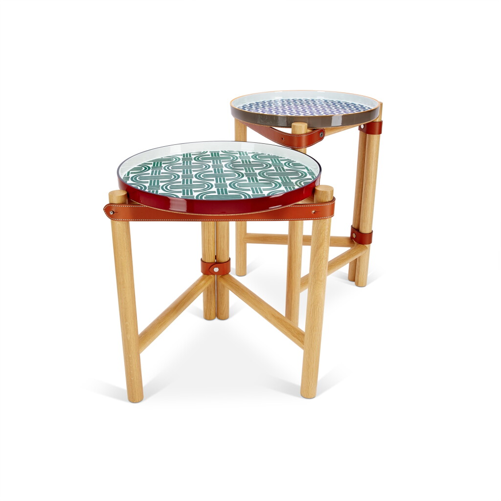 View full screen - View 1 of Lot 1136. Set of Two Oak, Porcelain and Bridle Leather Les Trotteuses d'Hermes Small and Medium Occasional Tables.