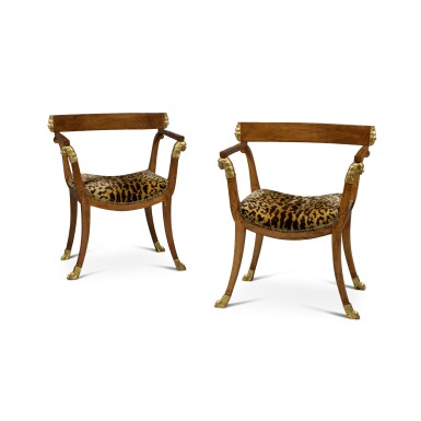 View full screen - View 1 of Lot 264. A Pair of North Italian Neoclassical Parcel-Gilt Fruitwood Armchairs, Early 19th Century.