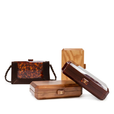 View full screen - View 1 of Lot 633. Frances Patiky Stein's Collection: Frances Patiky Stein's Collection: Set of Four Wood and Bakelite Minaudières and Brown Satin Minaudière Holder .
