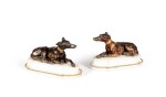 A pair of Louis XVI patinated bronze paper weights, circa 1780