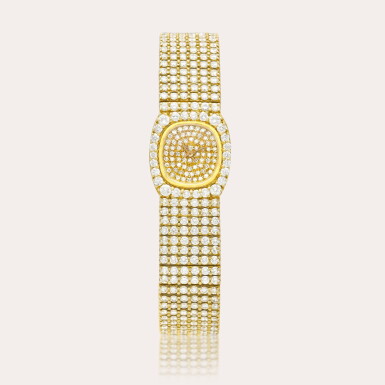 View full screen - View 1 of Lot 2106. A yellow gold and diamond-set bracelet watch, Circa 1990.