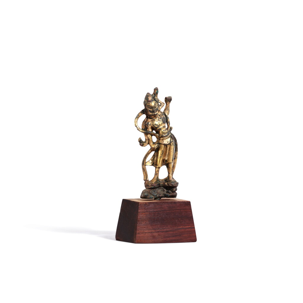 View full screen - View 1 of Lot 3618. A gilt-bronze figure of Buddhist guard, Tang dynasty | 唐 銅鎏金護法像.