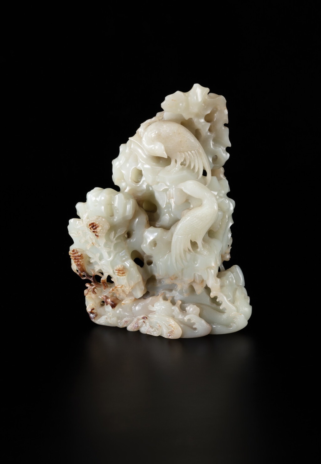 View full screen - View 1 of Lot 8. A finely carved pale celadon jade ‘peony and birds’ boulder Qing dynasty, 18th century | 清十八世紀 青白玉雕鳳凰牡丹紋擺件.