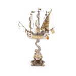 A monumental German parcel-gilt silver and amber nef, unidentified maker's mark, circa 1900