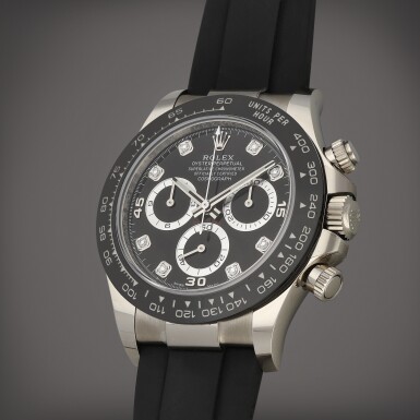 View full screen - View 1 of Lot 40. Daytona, Reference 116519LN | A white gold chronograph wristwatch with bracelet and diamond-set indexes | Circa 2021.