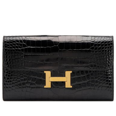 View full screen - View 1 of Lot 155. Black Shiny Porosus Crocodile and Cuivre Verso Constance Long Wallet Gold Hardware, 2017.