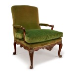 A GEORGE II MAHOGANY LIBRARY ARMCHAIR IN THE MANNER OF WRIGHT AND ELWICK, CIRCA 1755
