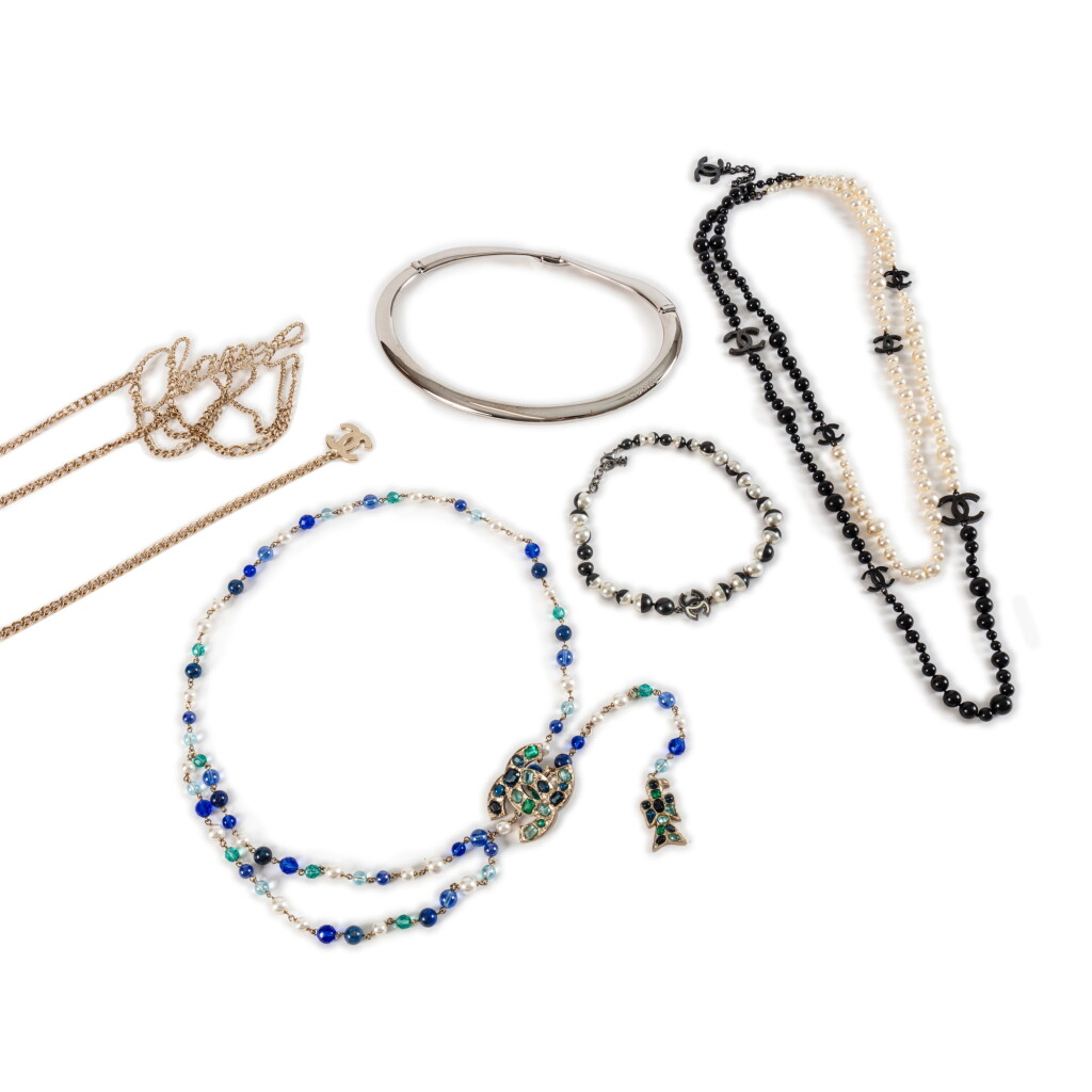 View full screen - View 1 of Lot 679. Set of Five Necklace, Belts and Bracelets.