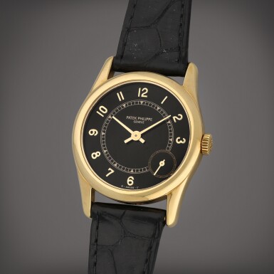 View full screen - View 1 of Lot 239. Reference 5000 | A yellow gold wristwatch | Circa 1996.