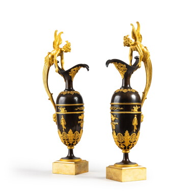 View full screen - View 1 of Lot 1. A pair of Empire gilt and patinated bronze ewers, circa 1810, attributed to Claude Galle.