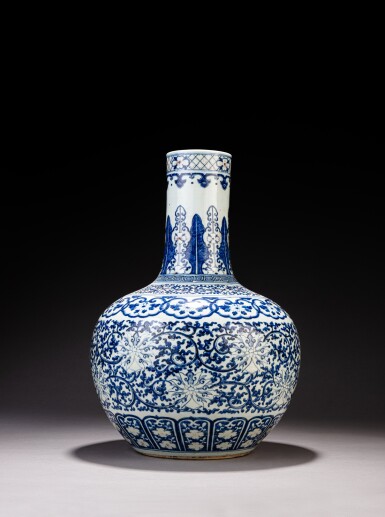 View full screen - View 1 of Lot 387. A large underglaze blue and copper-red-decorated bottle vase, Qing dynasty, 18th / 19th century.