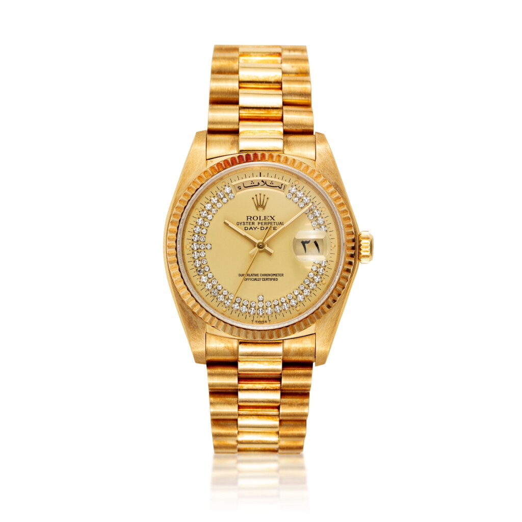 View full screen - View 1 of Lot 109. Day Date ‘Arabic Calendar’, Reference 18038 | A yellow gold and diamond-set wristwatch with Arabic day, date and bracelet | Circa 1984.