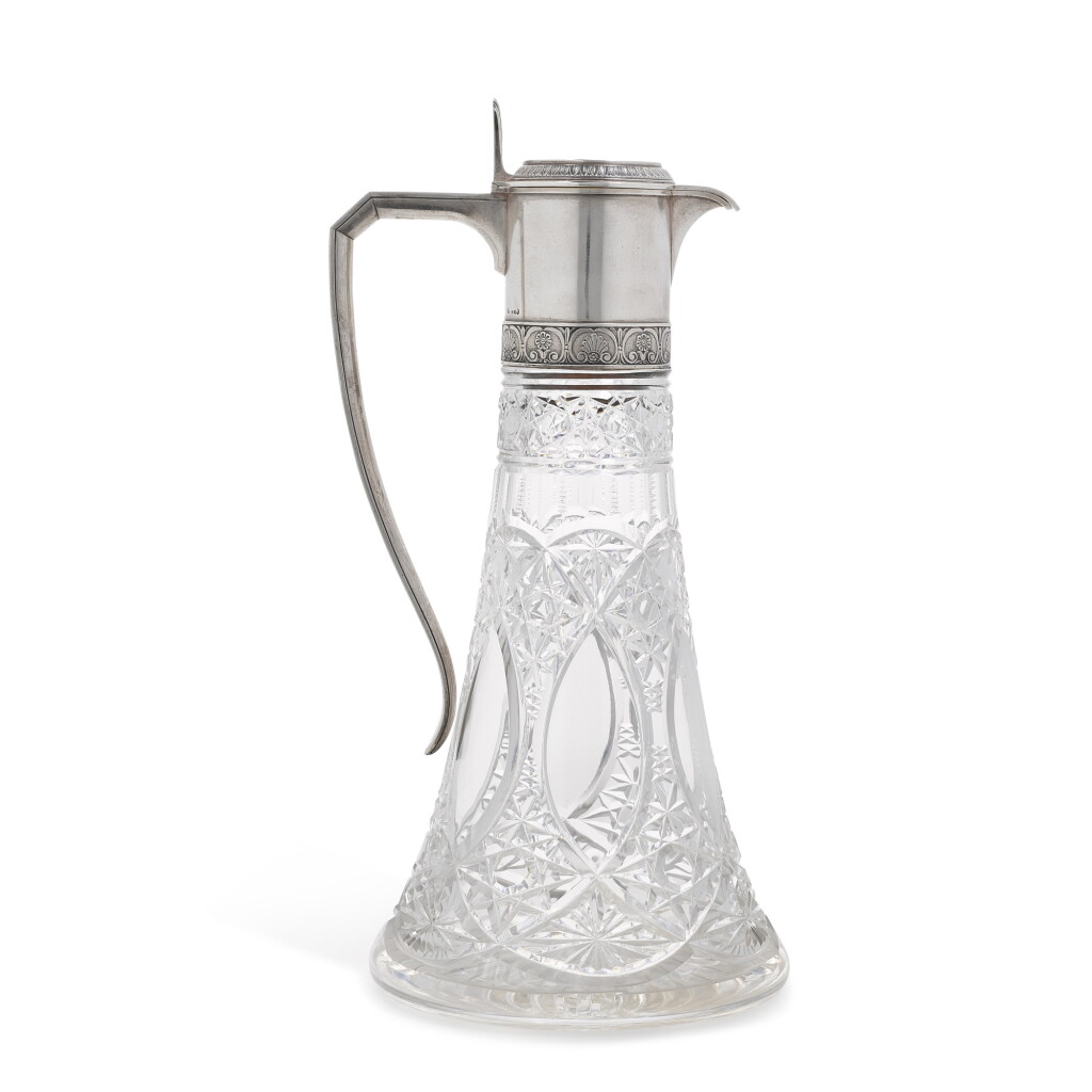 View full screen - View 1 of Lot 176. A Fabergé parcel-gilt silver-mounted cut-glass decanter, Moscow, 1908-1917.