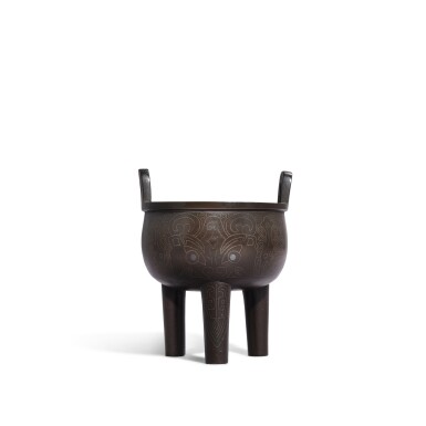 View full screen - View 1 of Lot 3594. A silver-inlaid bronze 'mask' tripod incense burner, ding, Early Qing dynasty | 清早期 銅錯銀獸面紋鼎式爐.