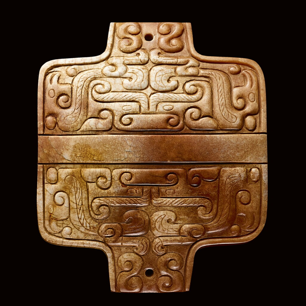 View full screen - View 1 of Lot 68. A JADE ARC-SHAPED 'ANIMAL MASK' ORNAMENT EASTERN ZHOU DYNASTY, SPRING AND AUTUMN PERIOD | 東周春秋時期 玉獸面紋拱形飾.