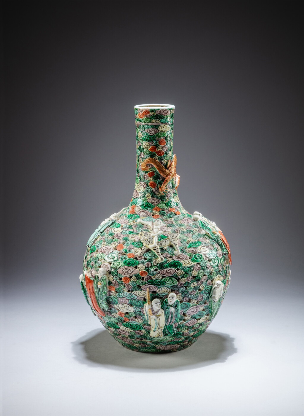 View full screen - View 1 of Lot 179. A famille-verte reticulated 'immortals' vase, Qing dynasty, 19th century | 清十九世紀 五彩鏤雕仙人圖瓶.