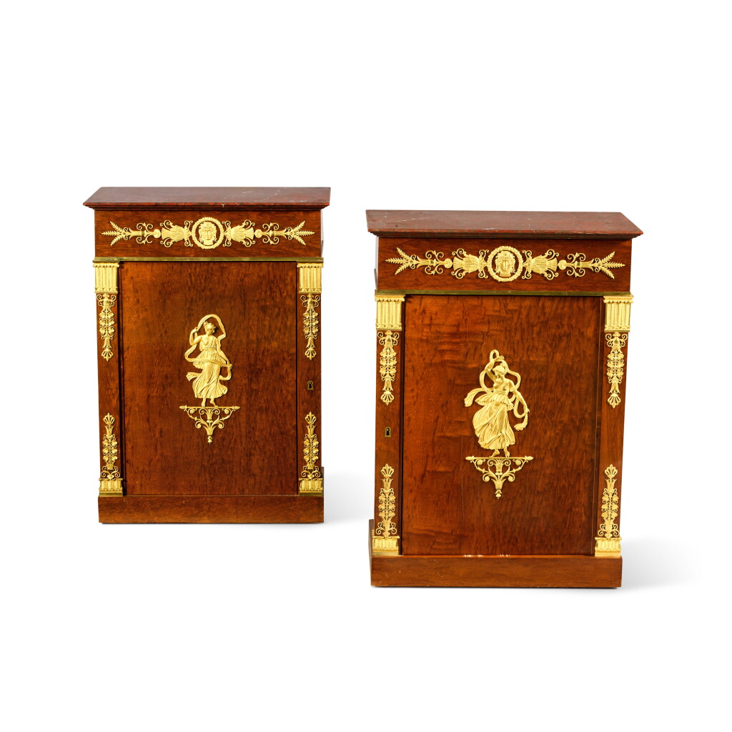 View full screen - View 1 of Lot 115. A pair of Empire gilt-bronze mounted mahogany meuble d'appui by Charles-Joseph Lemarchand, early 19th century.