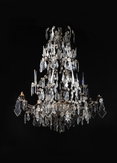 View full screen - View 1 of Lot 131. An Italian cut-glass and brass twenty-four-light chandelier, 19th century | Lustre à vingt-quatre lumières en laiton et verre taillé, Italie, XIXe siècle.