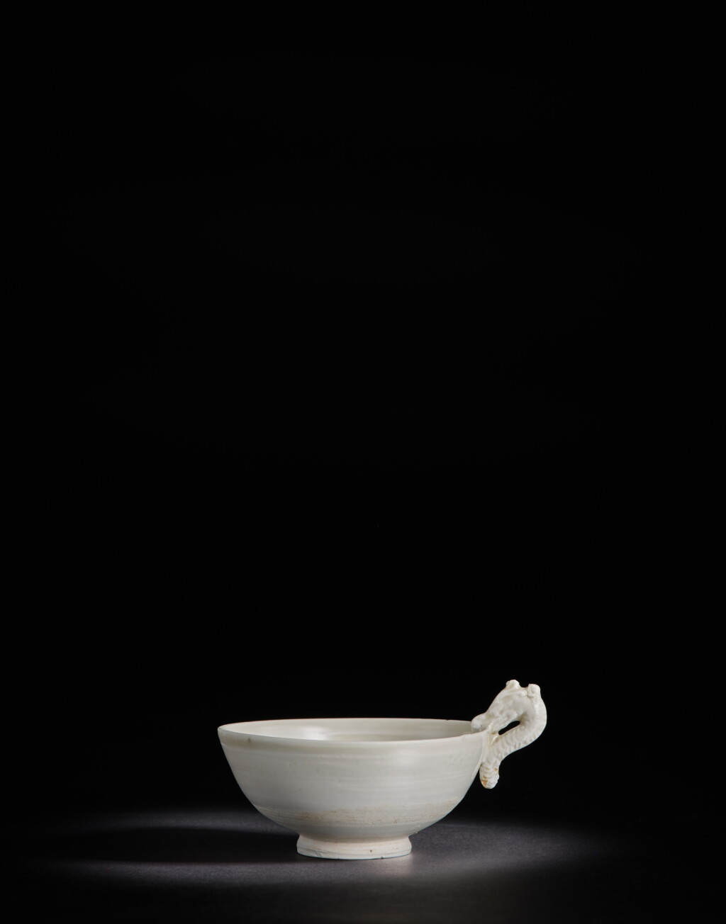 View full screen - View 1 of Lot 8011. A small white-glazed dragon-handled cup, Northern Song dynasty | 北宋 白釉龍柄盃.