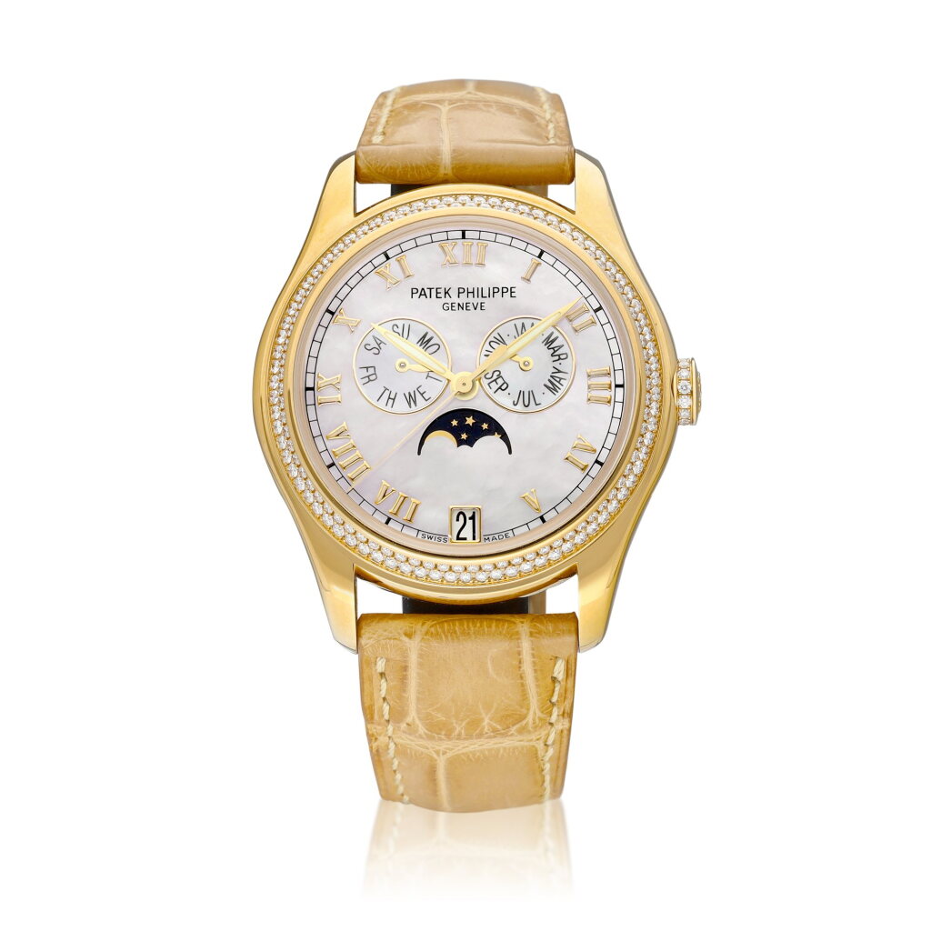 View full screen - View 1 of Lot 8116. Reference 4936 | A yellow gold and diamond-set annual calendar wristwatch with day, date, moon phases and mother-of-pearl dial, Circa 2007 | 百達翡麗 | 型號4936 | 黃金鑲鑽石年曆腕錶,備日期、星期、月相顯示及珠母貝錶盤,約2007年製.