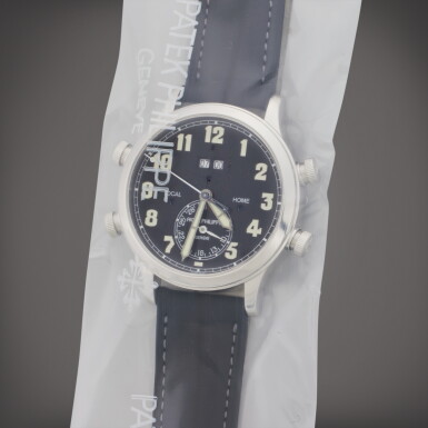 View full screen - View 1 of Lot 158. Reference 5520P-001 Alarm Travel Time | A platinum dual time alarm wristwatch with date, alarm time display, and alarm day/night indication, Service Sealed, Circa 2020.