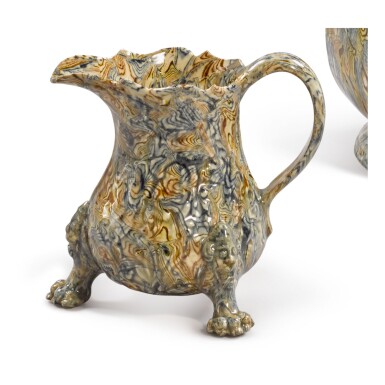 View full screen - View 1 of Lot 1628. A STAFFORDSHIRE SOLID-AGATE CREAM JUG, CIRCA 1750.