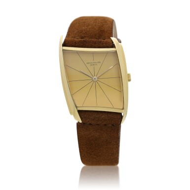 View full screen - View 1 of Lot 1. Reference 3424 A yellow gold asymmetrical wristwatch, designed by Gilbert Albert, Circa 1962 .