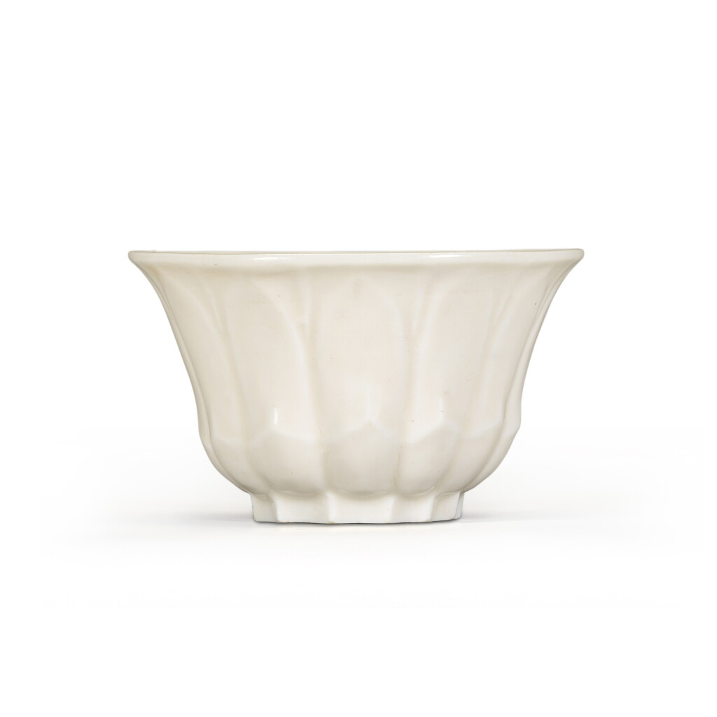 View full screen - View 1 of Lot 72. A 'Dehua' 'floral' bowl, Qing Dynasty, Kangxi period | 清康熙 德化白釉刻蓮瓣盌.