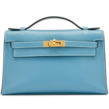 View full screen - View 1 of Lot 52. New Bleu Jean Swift Kelly Pochette Gold Hardware, 2023.