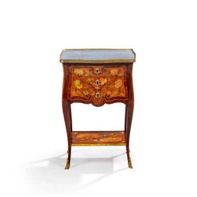 View full screen - View 1 of Lot 626. A Louis XV gilt-bronze-mounted bois satiné and amaranth occasional table, circa 1750, stamped by Jacques Dubois.