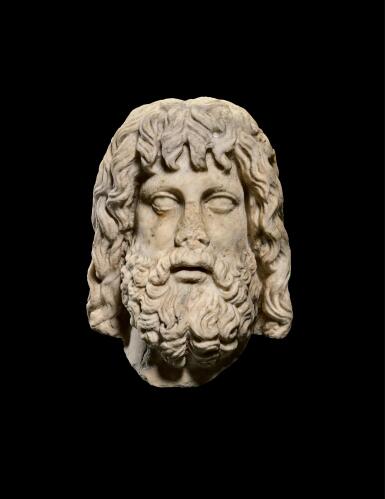 View full screen - View 1 of Lot 231. A ROMAN MARBLE HEAD OF SARAPIS, CIRCA 2ND CENTURY A.D., ON 19TH CENTURY HERM SHOULDERS.