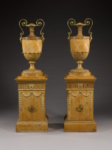 View full screen - View 1 of Lot 34. A pair of George III gilt-bronze mounted carved mahogany, lime and pine urns and pedestals by John Linnell, 1767, the urns designed by Robert Adam.
