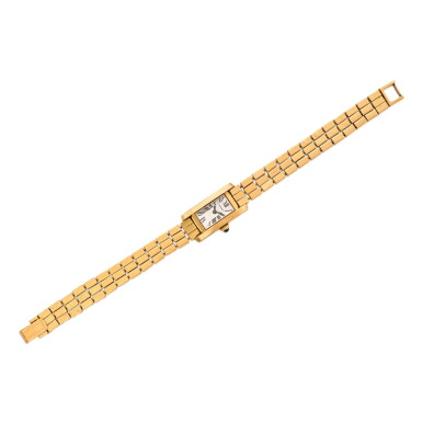 View full screen - View 1 of Lot 293. Gold 'Tank Américaine' Bracelet-Watch.