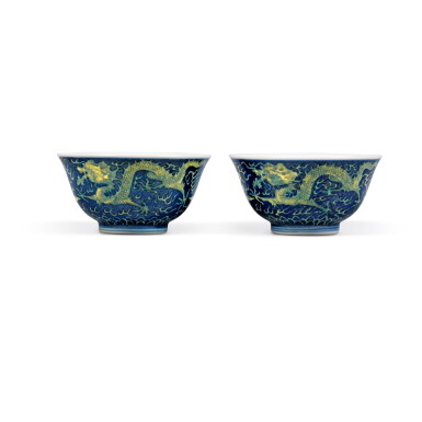View full screen - View 1 of Lot 872. A pair of blue-ground yellow-enameled 'dragon' bowls, Marks and period of Guangxu | 清光緒 青花地黃釉遊龍戲珠紋盌一對 《大清光緒年製》款.