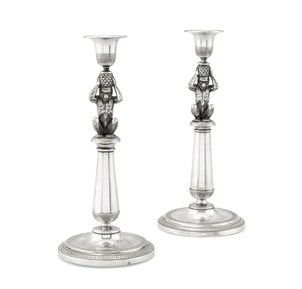 View full screen - View 1 of Lot 303. An Italian pair of silver candlesticks, with monkeys, Emanuele Caber, Milan, circa 1820 | Paire de flambeaux en argent, à décor de singes par Emanuele Caber, Milan, vers 1820.