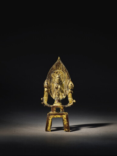 View full screen - View 1 of Lot 3504. A gilt-bronze Buddhist triad Northern Wei dynasty | 北魏 鎏金銅一佛二菩薩立像.