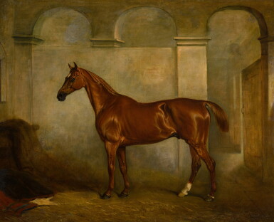 View full screen - View 1 of Lot 144. A chestnut hunter in a stable.