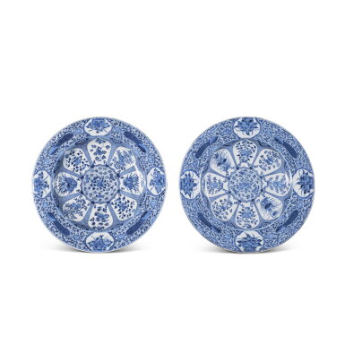 View full screen - View 1 of Lot 392. A pair of large blue and white 'floral peacock' dishes, Qing dynasty, Kangxi period | 清康熙 青花開光孔雀花卉紋大盤一對.