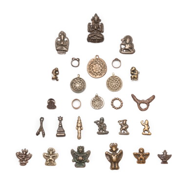 View full screen - View 1 of Lot 40. A study collection of twenty-seven ornaments, Thokcha, Tibet and other Himalayan regions, 10th - 14th century | 西藏及喜馬拉雅其他地區 十至十四世紀 托查一組二十七件.