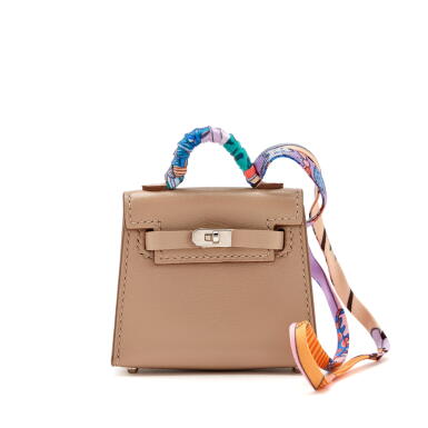 View full screen - View 1 of Lot 93. Argile Tadelakt Micro Twilly Kelly Bag Charm Palladium Hardware, 2021.