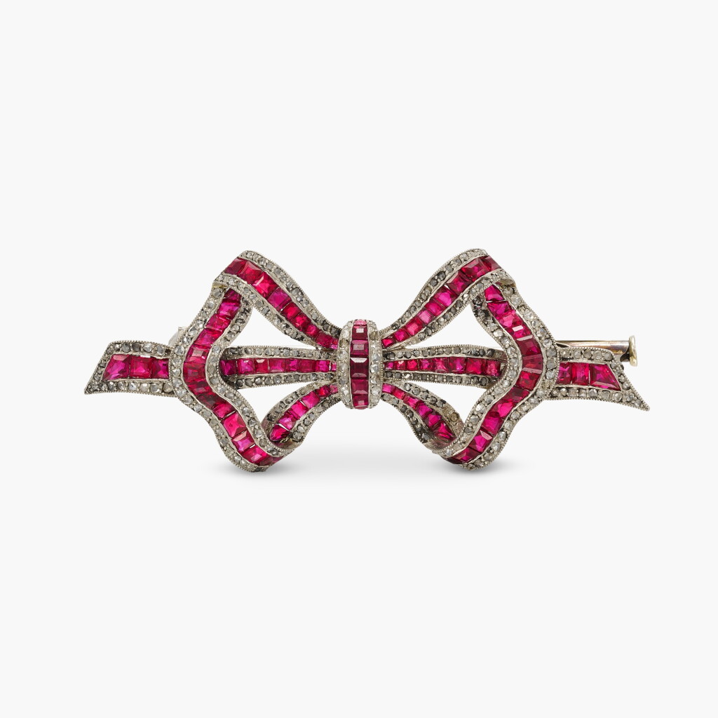 View full screen - View 1 of Lot 4. Ruby and Diamond Bow Brooch.