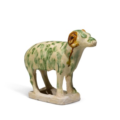 View full screen - View 1 of Lot 101. A small sancai-glazed figure of a ram, Tang dynasty | 唐 三彩羊.