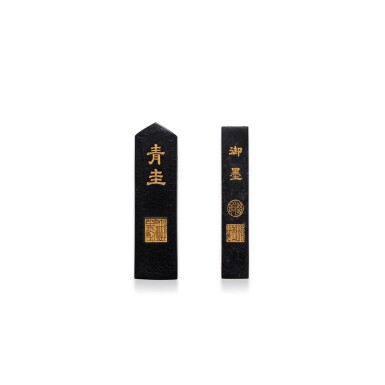 View full screen - View 1 of Lot 5908. Two gilt-inscribed ink sticks, Qing dynasty, 19th century | 清十九世紀 仿乾隆龍紋「青圭」墨 及 「御用淳化軒慕古寶墨」.