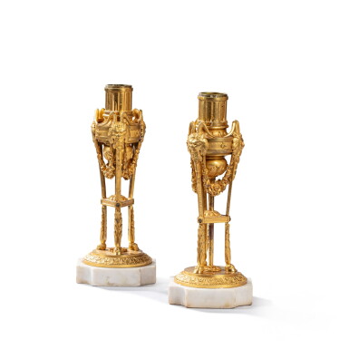 View full screen - View 1 of Lot 746. A pair of Louis XVI style gilt-bronze candlesticks, 19th century.