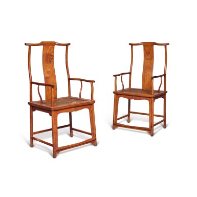 View full screen - View 1 of Lot 46. A pair of 'huanghuali' 'Official's Hat' yokeback armchairs (Sichutou Guanmaoyi), Late Ming dynasty, 17th century.